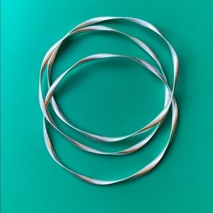 Premier Designs silver bangle bracelets.